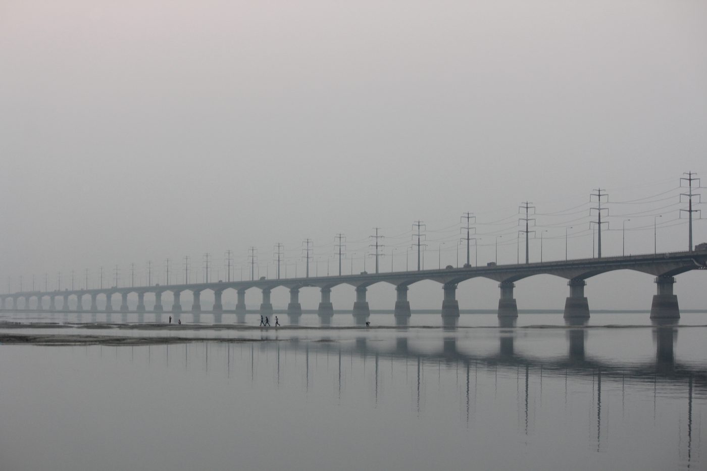 Bangabandhu Jamuna Bridge, Bangladesh — multi-span prestressed concrete viaduct seen across the river in morning haze